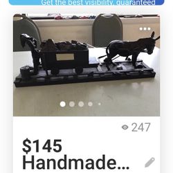 Donkey and men made out of coal