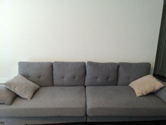Light Gray Upholstered Sectional Sofa With Storage Ottoman