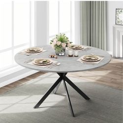 Very high quality and very stylish round table and 4 chairs, barely used, like new