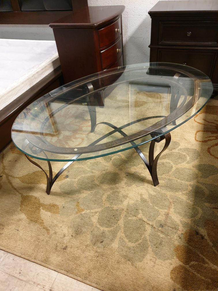 Metal coffee table top glass 52'×34' height 19' in excellent condition