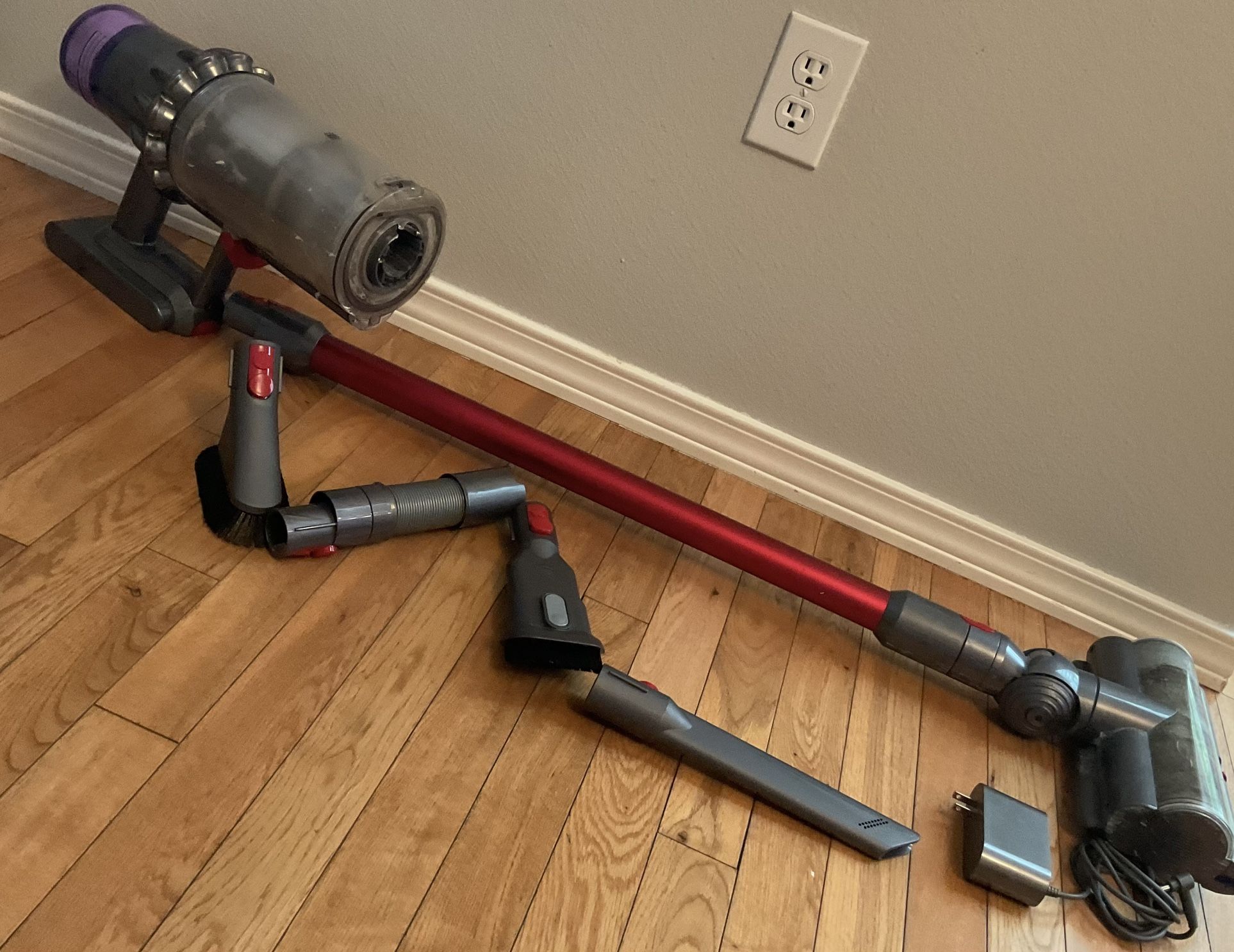 Dyson vacuum with all attachments and charger