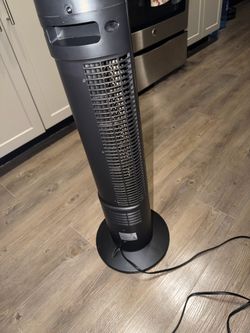 Rotating standing fan