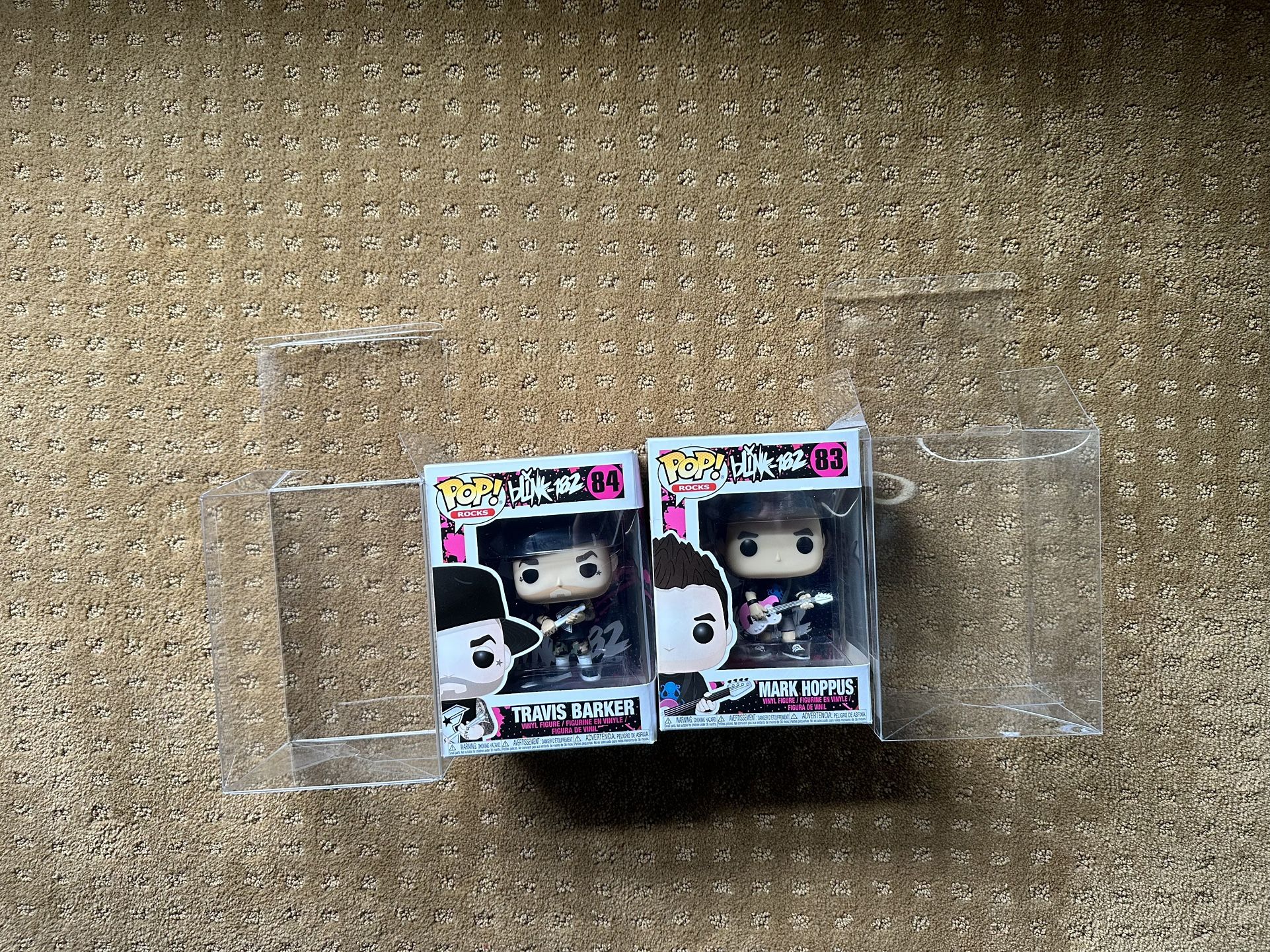 Mark Hoppus and Travis Barker from Blink-182 Funko Pops