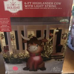 Holiday Time 6-Ft Highlander Cow with Light String Airblown Inflatable yard decoration. 
