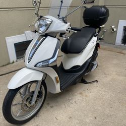 Motorcycle Vespa Piago