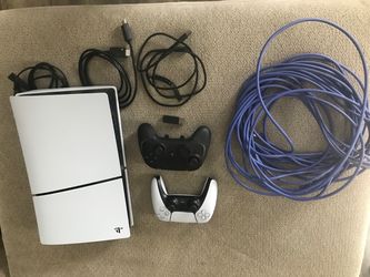 Ps5 with added wolverine controller and Ethernet cord
