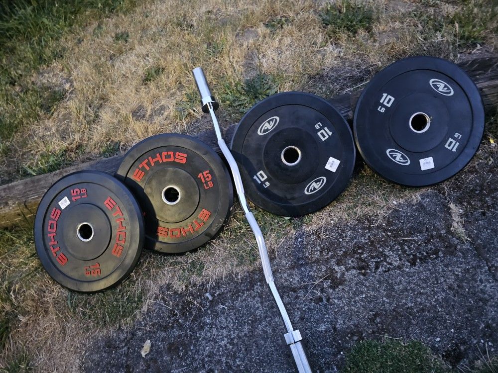 Bumper Plates And Curl Barbell