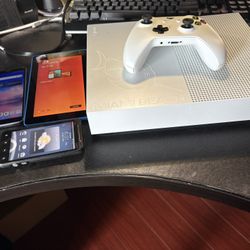 Xbox 1 s/ a backbone controller/2 phones /tablet