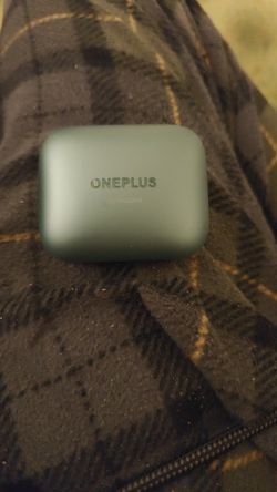 OnePlus Buds Pro 2 wireless earbuds in the Arbor Green