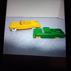 Two VINTAGE COLLECTIBLE AUBURN RUBBER CARS