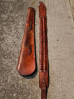 Rifle scabbard  and cartridge belt