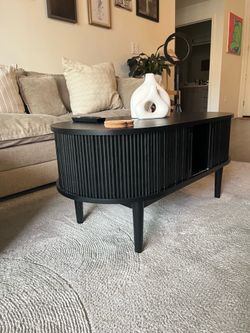 Black Oval Tambour Coffee Table