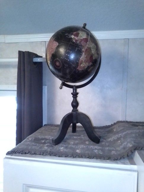 Small Globe On Wooden Stand