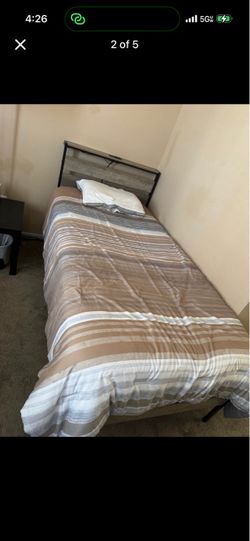 2 twin bed frames and mattresses