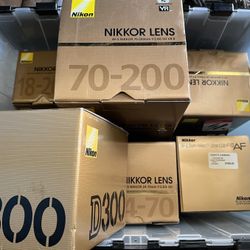 nikon boxes and lens hard cases ONLY  