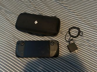 Steam Deck LCD 64 GB (w/ charger and carrying case)