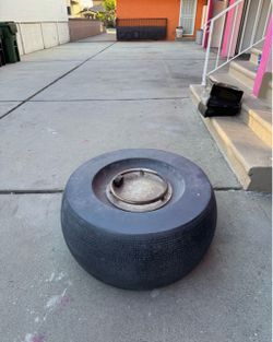 Outdoor Tire-Style Fire Pit – $80