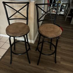 Two Brown Counter Stools Turn