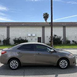 2017 Toyota Corolla LE - Salvage title
