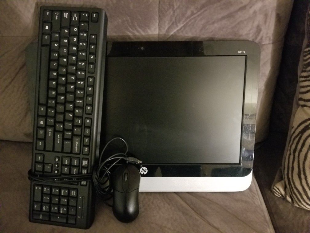 All-in-one HP computer, Smart remote, Sling TV, Apple TV 1st generation