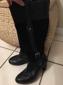 Black leather boots size 8.