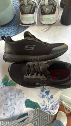 Women’s black sketchers