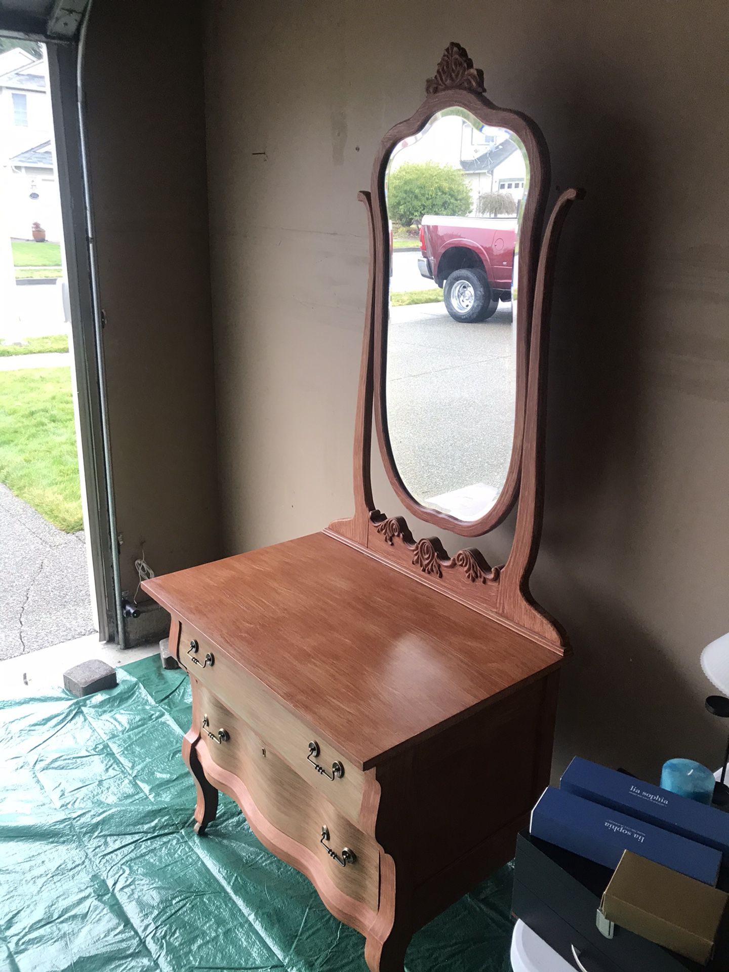 Antique dresser with mirror.