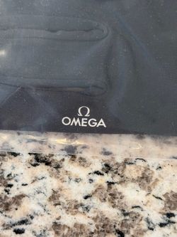 Omega watches glove never been used size large