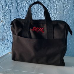 Skil - corded drill with bag tool