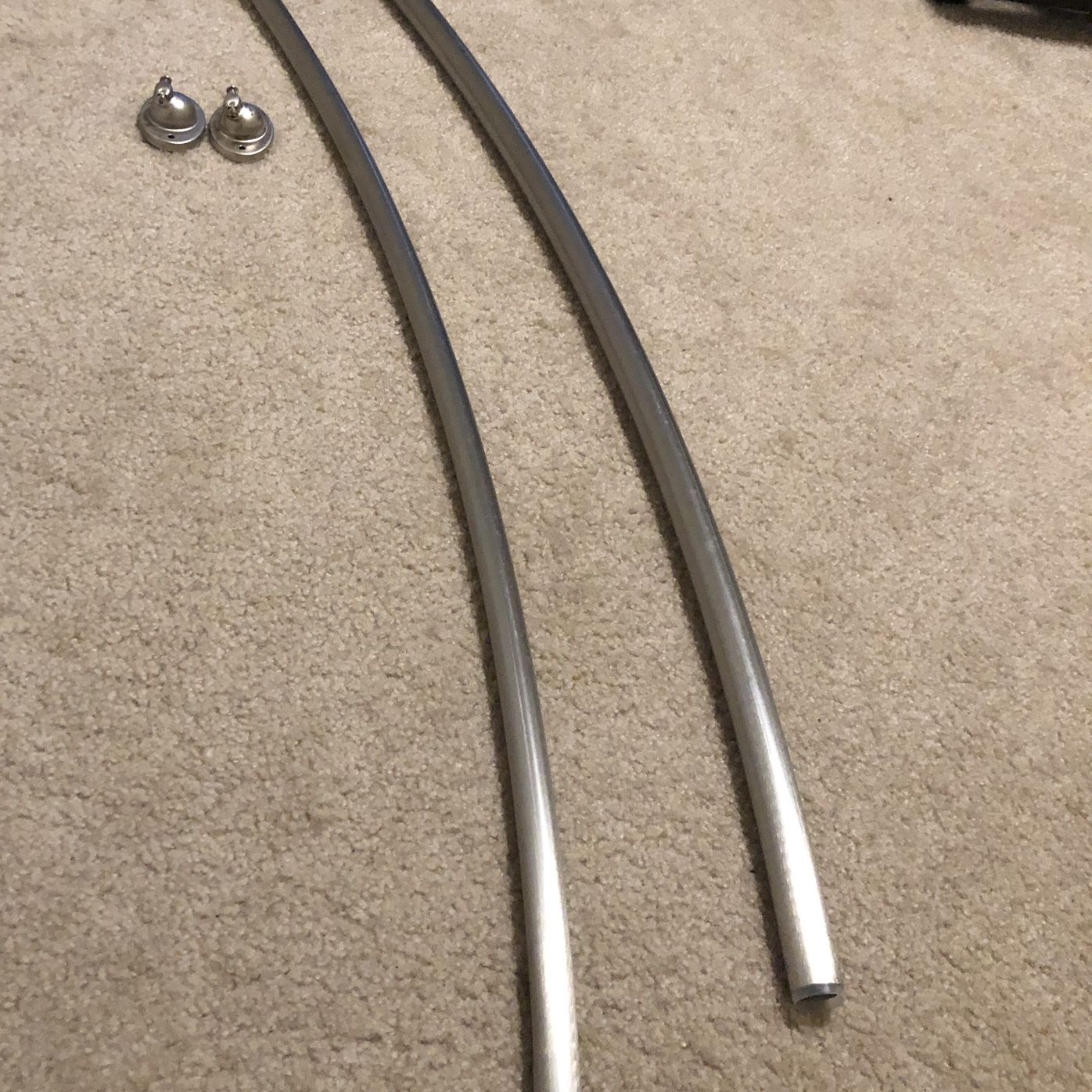 Curved shower rod