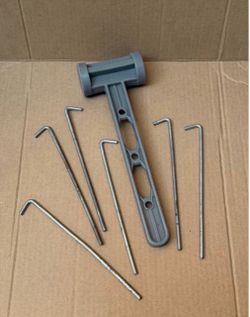 Camping plastic hammer and steel tent pegs
