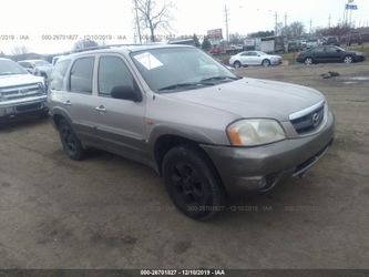 2001 Mazda Tribute-Ford Escape- v6 3.0 engine - all wheel drive for parts