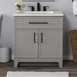 Style Selections Potter 30-in Light Gray Single Sink Bathroom Vanity with White Cultured Marble Top  Check the picture for cut in the back