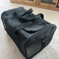 Soft-sided black pet carrier with strap. 17x12x11