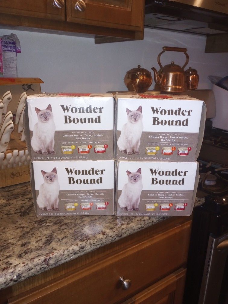 4 Boxes Of Cat Food