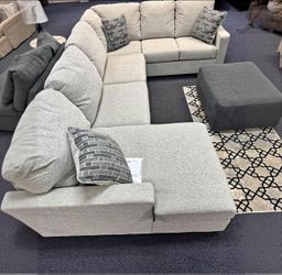 Light Gray Fabric Sectional Sofa with Accent Pillows