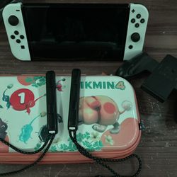 Nintendo switch OLED with  Pikmin carrier case