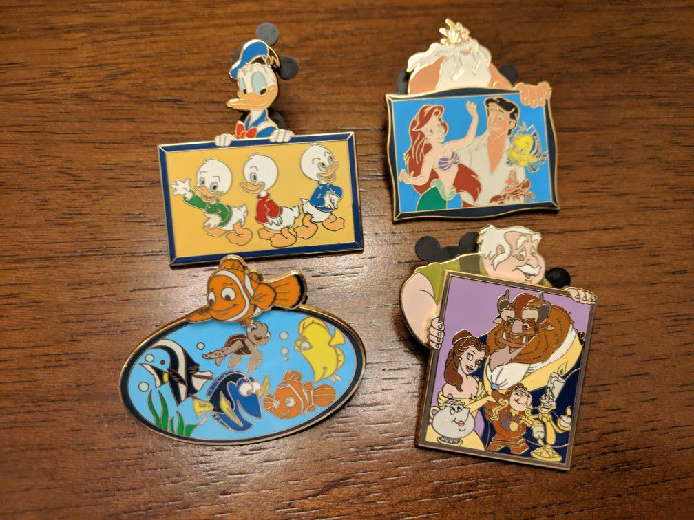 Disney shopping limited edition pin of 250. Set of four pins from The Father's day portrait series in 2007.