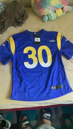 It’s a NFL shirt. The Size is large. The color is gurley ll