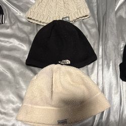 3 Hats. 2 Northface One Columbia