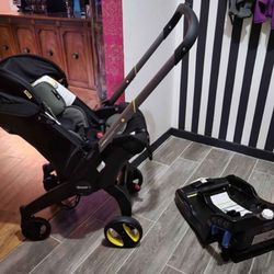 Doona Infant Car Seat/Stroller all-in-one with base.  No accidents