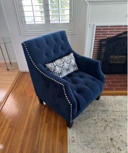 Two blue velvet chairs