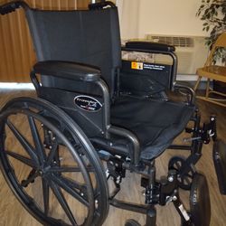 Manual Wheelchair W/Elevated Legs 