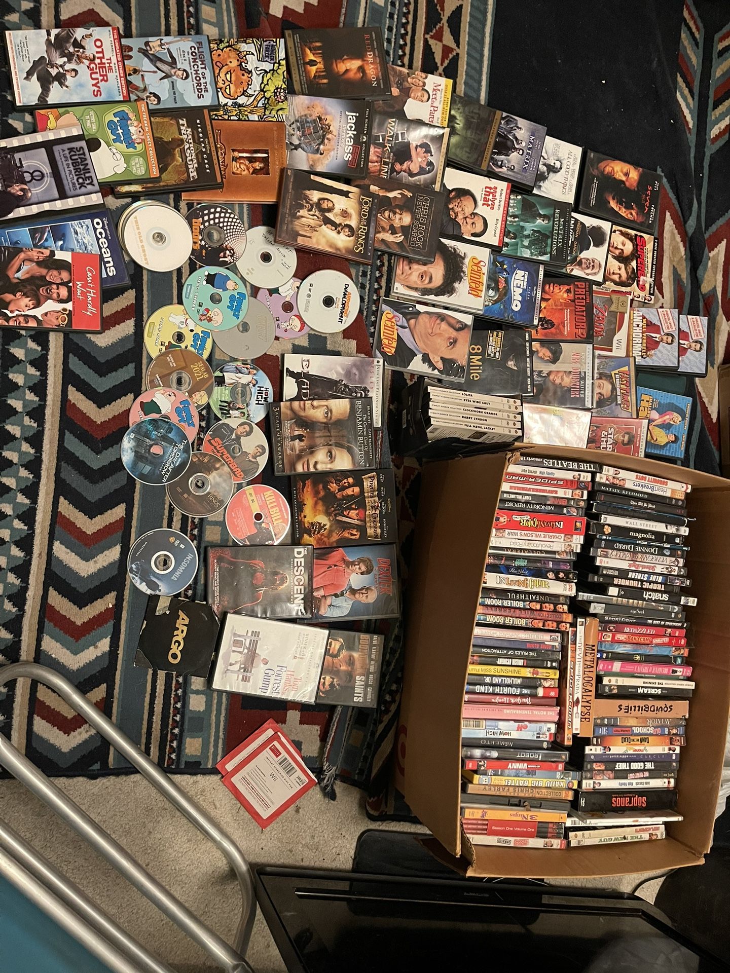 Wholesale Lot of Assorted DVDs, box sets, television series, and DVD player (over 300)