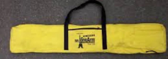 The original Mr. Long arm in a yellow bag The original Mr. Long arm in a yellow bag