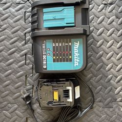 Makita DC18SD Charger with a 18v 5 AMP Battery 
