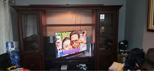 Beautiful Large Wood Entertainment Center for free