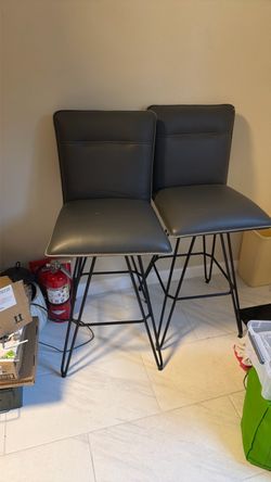 2 grey bar chairs