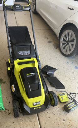 RYOBI Cordless Lawn mower With Battery And Charger (nearly New)