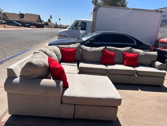 Sectional sofa couch gray color.